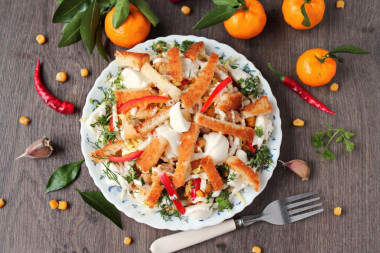 Jealous salad with mozzarella, crackers and tangerines