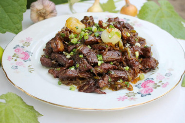 Beef on a fire in a cauldron by Chinese