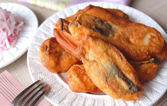 Pink salmon in batter on corn starch