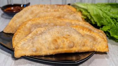 Perfect chebureks stuffed with minced meat