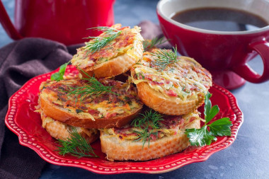 Sandwiches in a frying pan with sausage