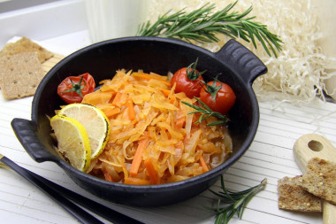 Stewed cabbage with carrots and onions