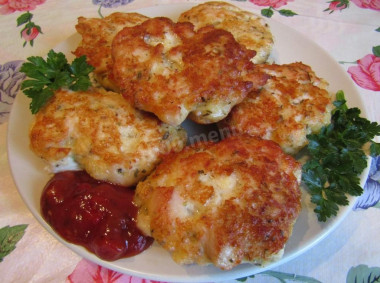 Chicken cutlets with hard cheese and garlic