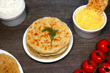 Cheese tortillas with milk in a frying pan