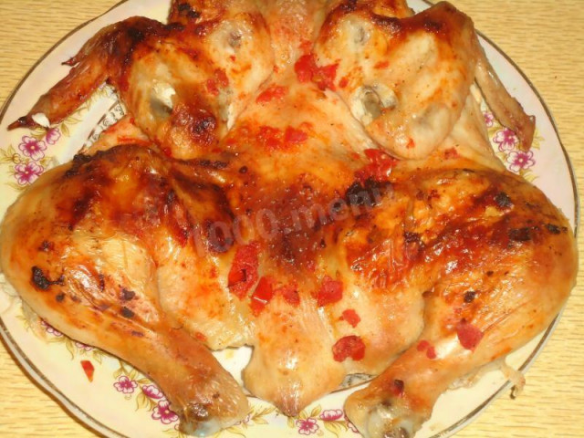 Tobacco chicken in adjika with butter