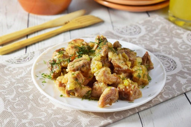 Pork in a frying pan with minimum ingredients