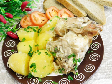 Rabbit stewed in sour cream with potatoes