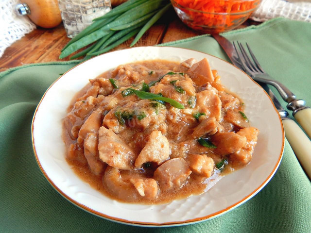 Chicken fillet in a pan in sauce