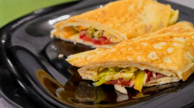 Egg roll stuffed with cheese and vegetables