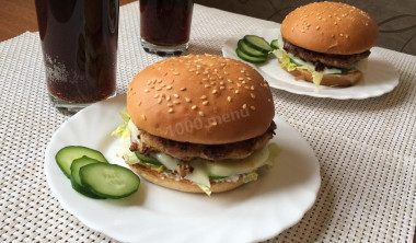 Homemade hamburger with minced pork and mozzarella