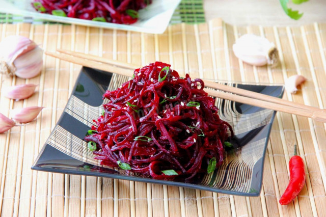 Korean raw beetroot salad with onion and garlic