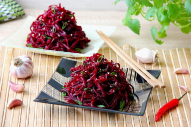 Korean raw beetroot salad with onion and garlic