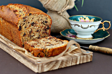 Banana cupcake with chocolate, nuts, apples