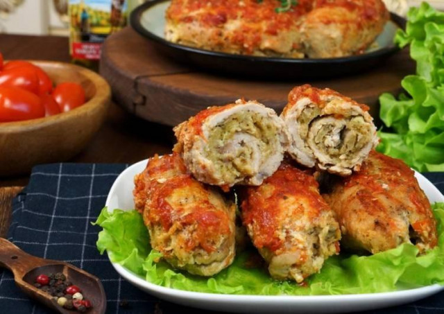 Meat rolls with cheese and mushroom filling