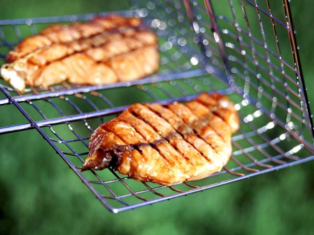 White cupid on the grill