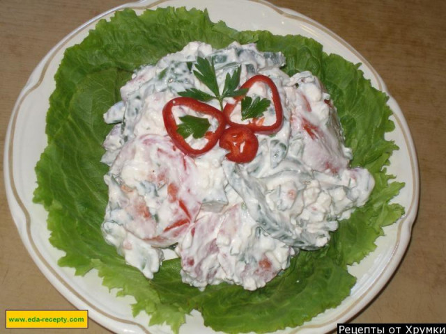 Bulgarian cheese salad with tomatoes and peppers and cucumbers