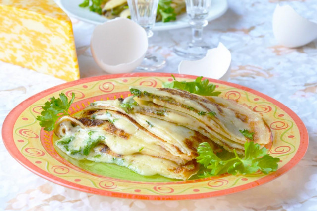 Pancakes with cheese and herbs