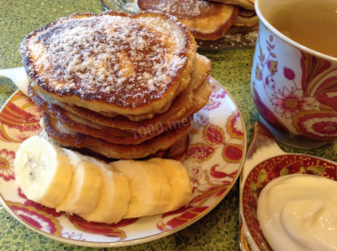 Pancakes with apples and bananas on kefir