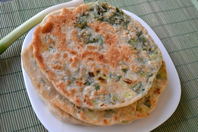 Placinda with herbs in a frying pan