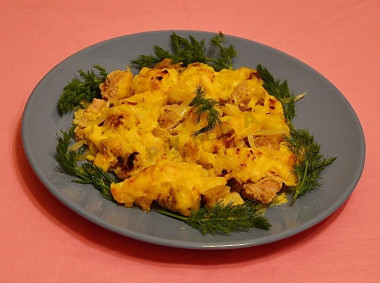 Pork with oranges and cheese in the oven