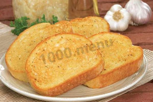 Croutons from a wheat loaf in a frying pan