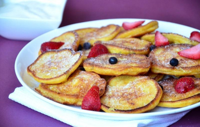 Pancakes with pumpkin puree and apples on sour cream