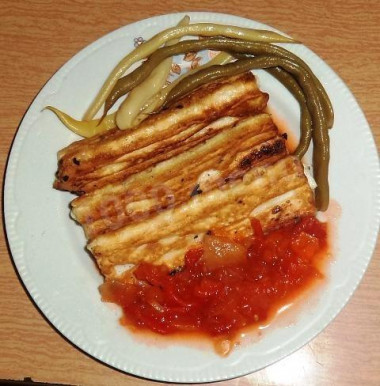 Crab sticks stuffed with carrots in batter