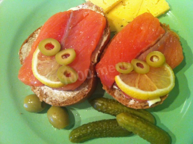 Sandwiches with red fish and butter