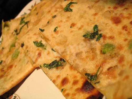 Potato tortillas in a frying pan