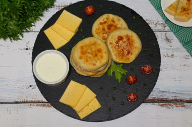 Fried kefir cheese tortillas made of dough with baking powder