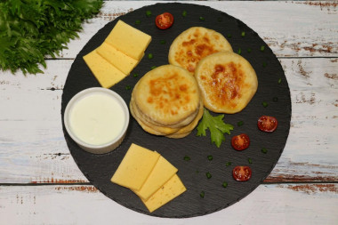 Fried kefir cheese tortillas made of dough with baking powder