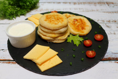 Fried kefir cheese tortillas made of dough with baking powder