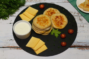 Fried kefir cheese tortillas made of dough with baking powder