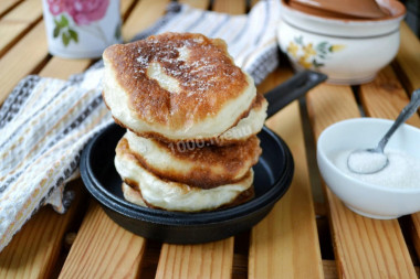 Fried crumpets in a frying pan