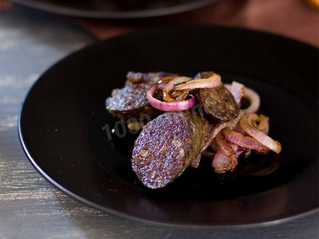 Black pudding fried in a pan