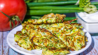 Pancakes from young zucchini with garlic and dill