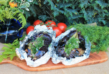 Eggplant in foil on coals