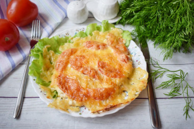 Pork chops baked in the oven with cheese