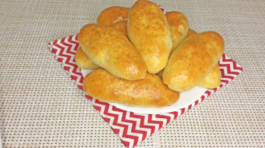 Pies with potatoes and mushrooms in the oven