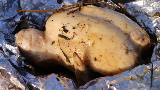 Chicken with salt in a cauldron