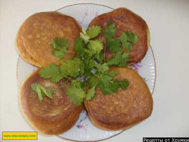 Pancakes with boiled sausage on curdled milk