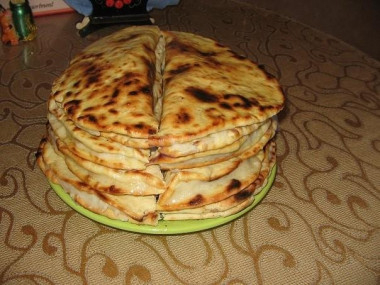 Tatar flatbreads with milk with potatoes and herbs