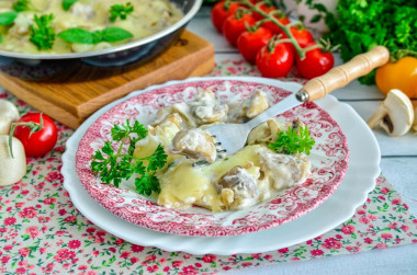 Julienne with mushrooms in a pan with sour cream classic 1