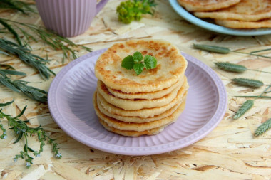 Flatbreads with cheese without yeast on kefir in a frying pan