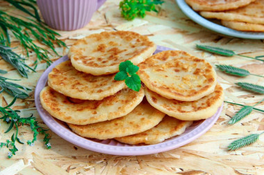 Flatbreads with cheese without yeast on kefir in a frying pan