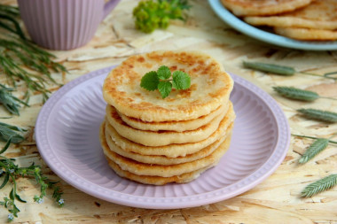 Flatbreads with cheese without yeast on kefir in a frying pan