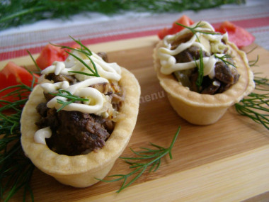 Belarusian salad with liver and mushrooms in tartlets