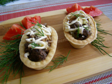 Belarusian salad with liver and mushrooms in tartlets