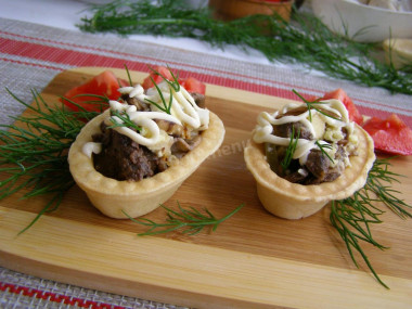 Belarusian salad with liver and mushrooms in tartlets