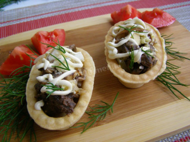 Belarusian salad with liver and mushrooms in tartlets